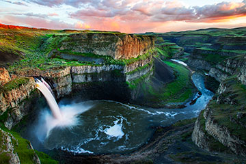 An aerial view of a canyon waterfall