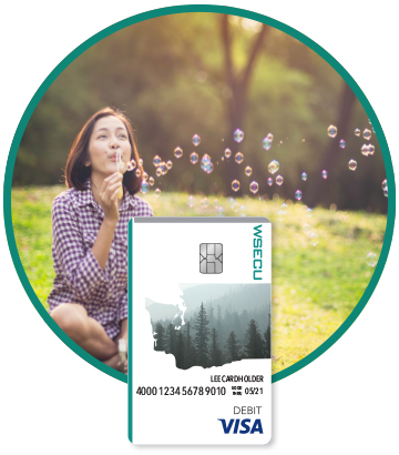 Girl blowing bubbles and WSECU Debit Card