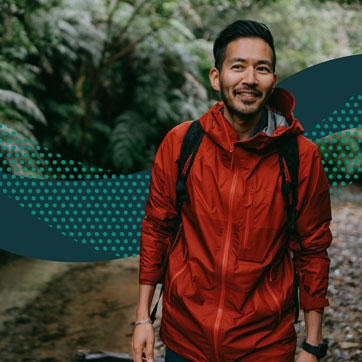 a man hiking in a forest