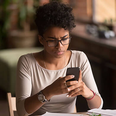 Woman looking at cell phone