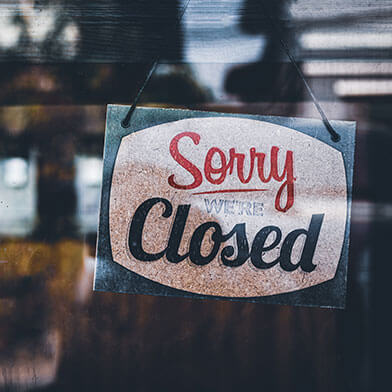 Closed sign on store window