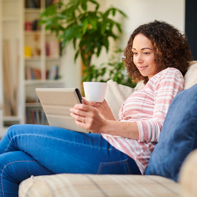 women holding laptop