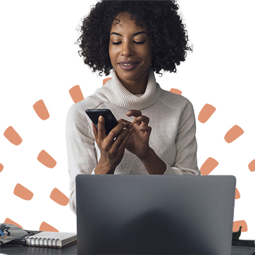 woman with phone and computer