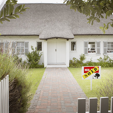 House with a sold sign