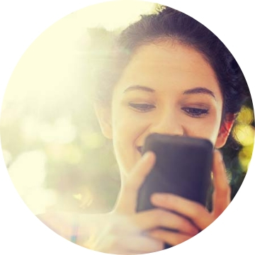 A woman holding a cell phone