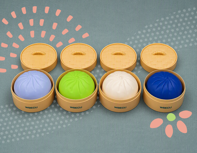 An assortment of WSECU-branded squishy bao buns.